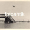 Fieseler Fi 156 Storch aircraft over a destroyed bridge, 1941 photo #3306